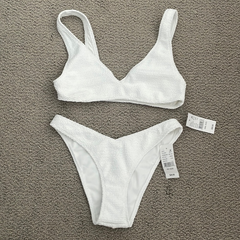 Pacsun white high waisted bikini new never been worn. Small top, x-small bottom